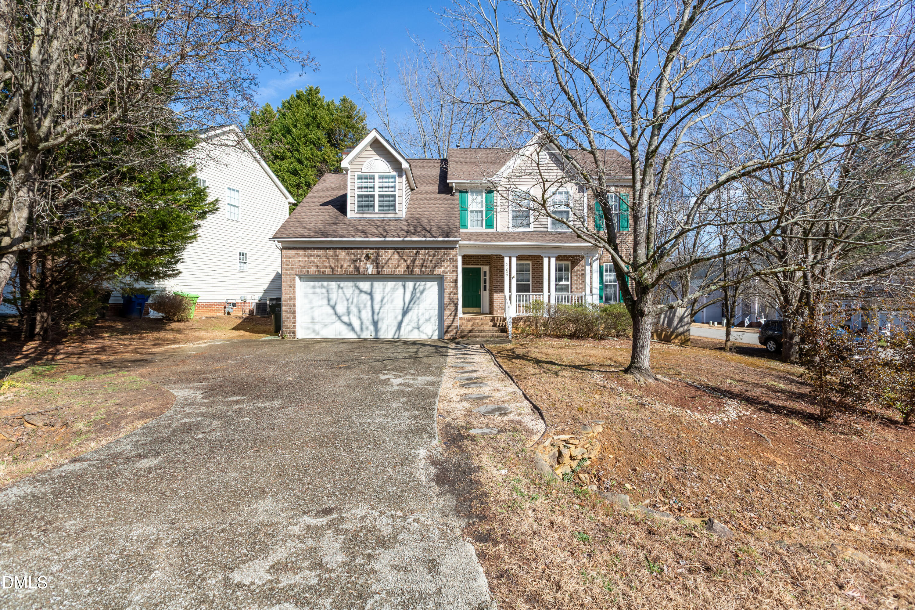 2339 School Creek Place Raleigh, NC 27606 - Photo 3 of 59 front view of a house with a yard