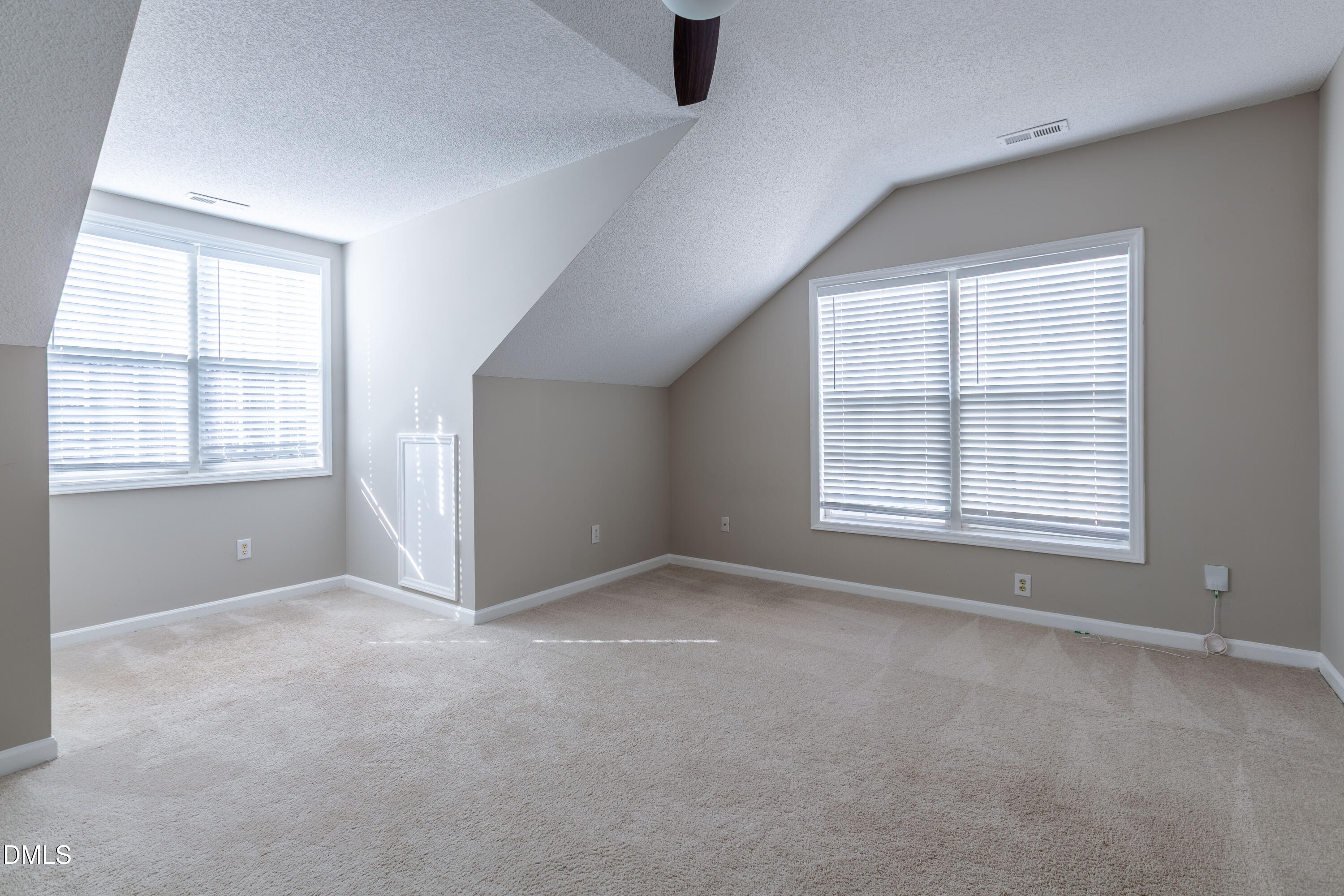 2339 School Creek Place Raleigh, NC 27606 - Photo 34 of 59 an empty room with windows