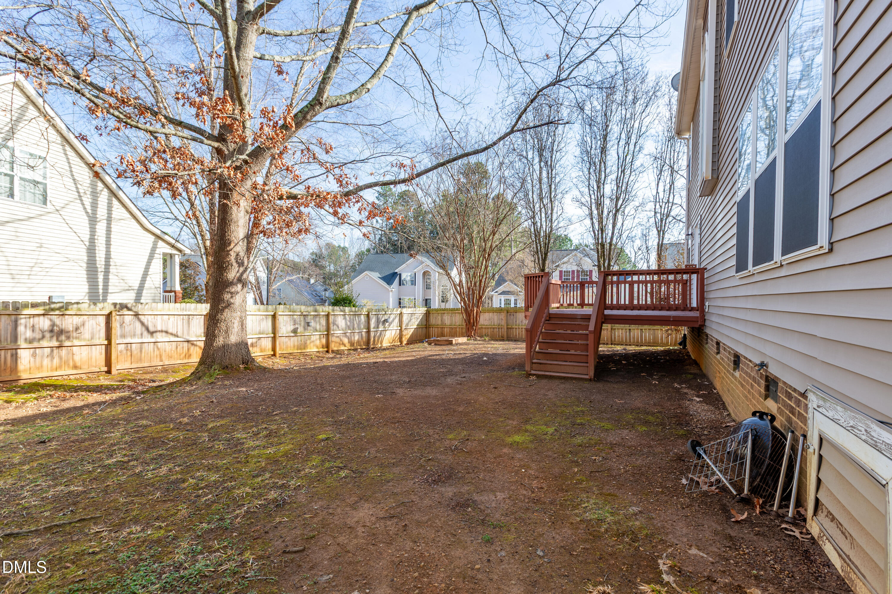 2339 School Creek Place Raleigh, NC 27606 - Photo 40 of 59 a view of a house with a yard