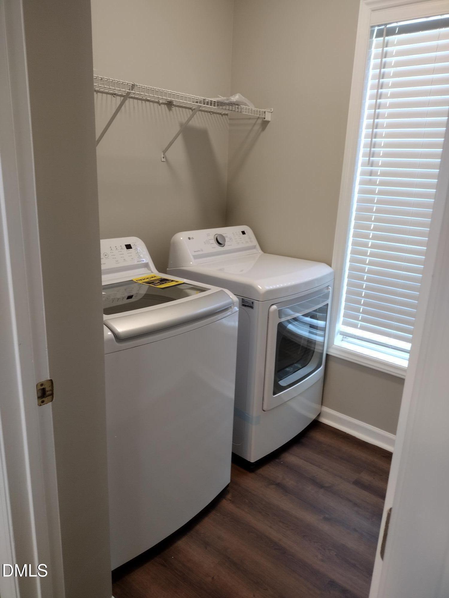 2339 School Creek Place Raleigh, NC 27606 - Photo 5 of 11 a utility room with dryer and washer