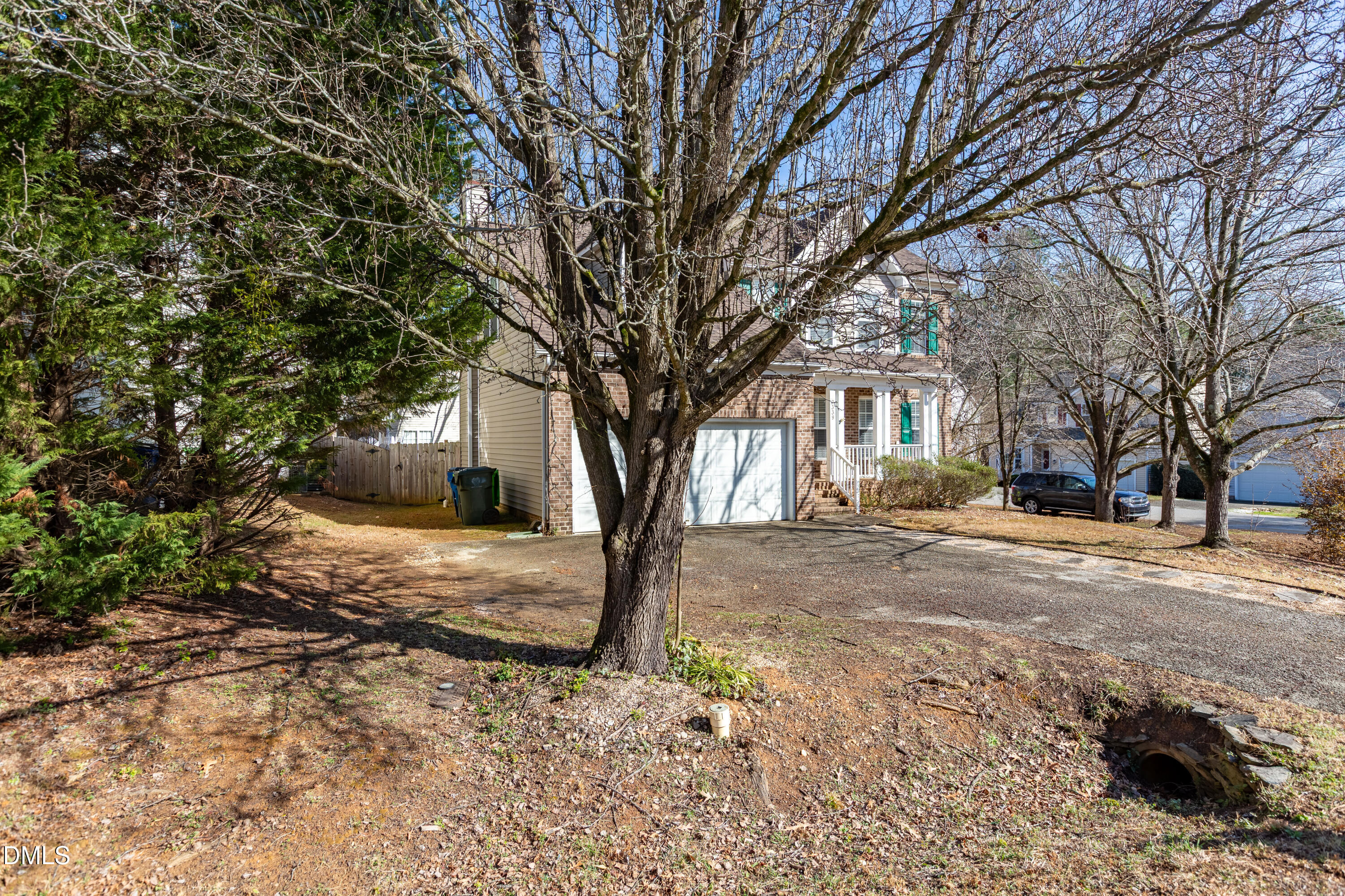 2339 School Creek Place Raleigh, NC 27606 - Photo 5 of 59 a view of a yard with a tree