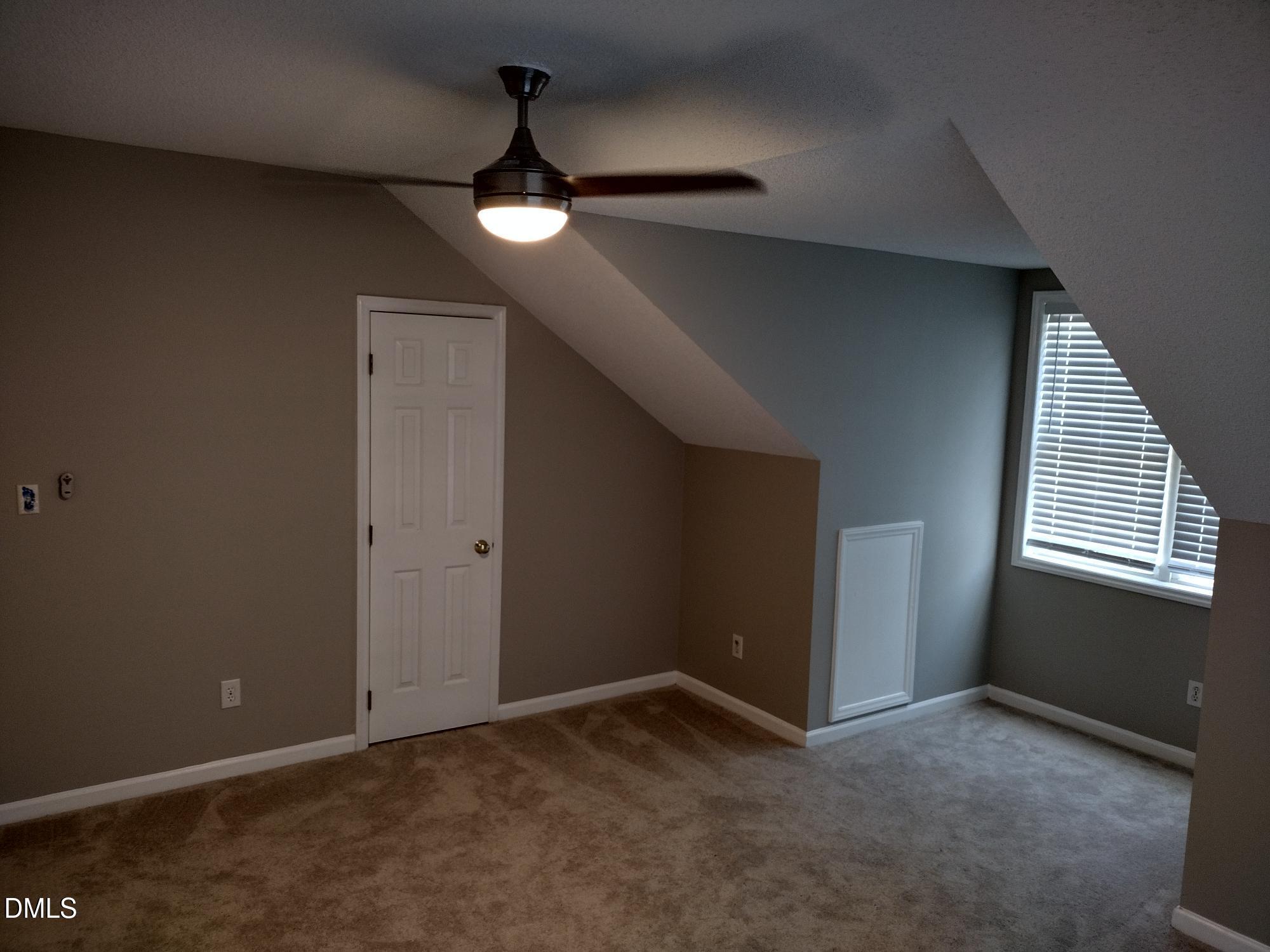 2339 School Creek Place Raleigh, NC 27606 - Photo 10 of 11 a view of an empty room with a window