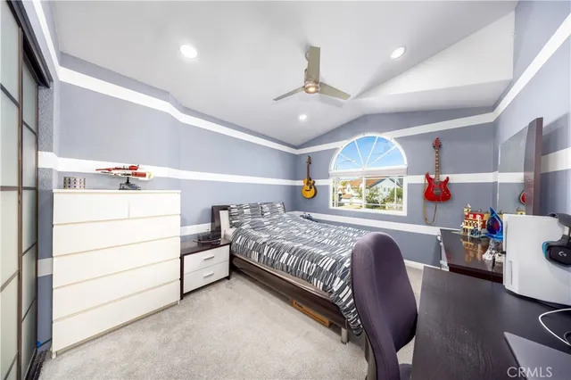 a bedroom with a bed and furniture