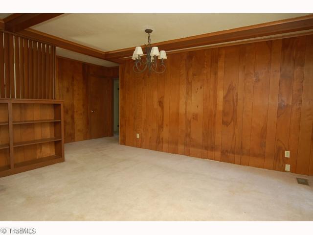 7005 Cruthis Road High Point, NC 27263 - Photo 3 of 13 Dining Room. The dining room is adjacent to the kitchen and provides access to the backyard and patio. This room could also be used as a den.