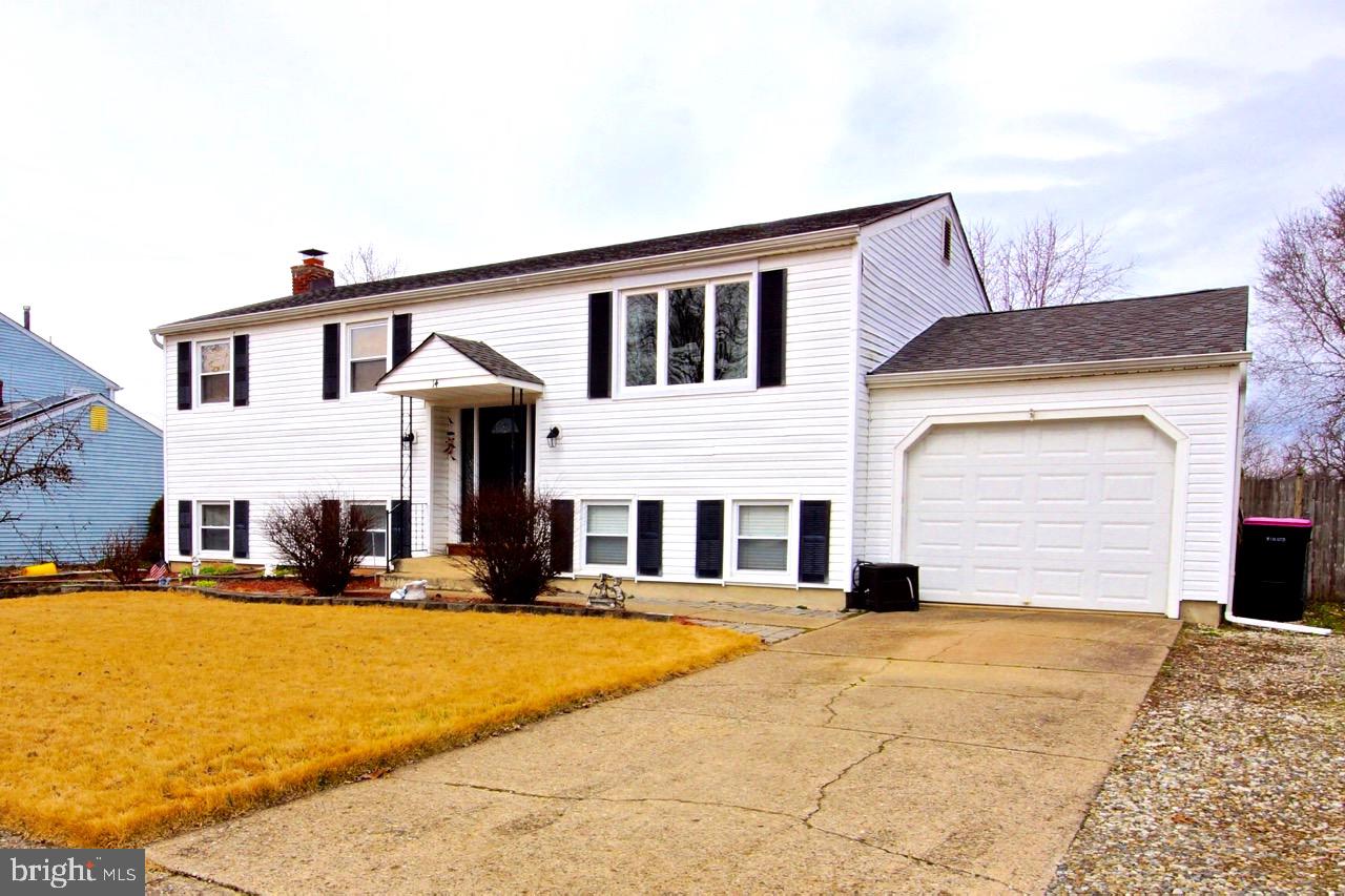 14 Constitution Road Clementon, NJ 08021 - Photo 1 of 27 a view of a white house with a outdoor space
