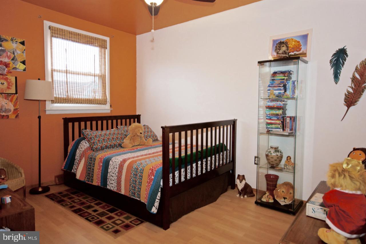 14 Constitution Road Clementon, NJ 08021 - Photo 13 of 27 a bedroom with a bed and a window