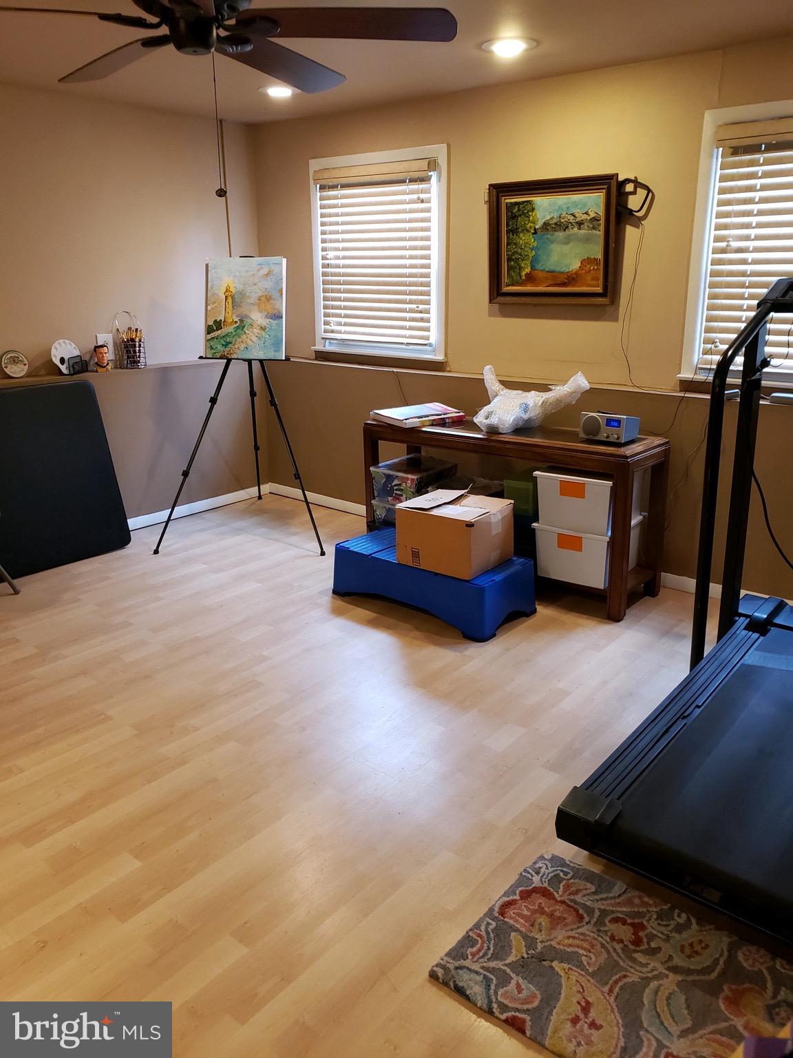 14 Constitution Road Clementon, NJ 08021 - Photo 19 of 27 a living room with furniture and a wooden floor