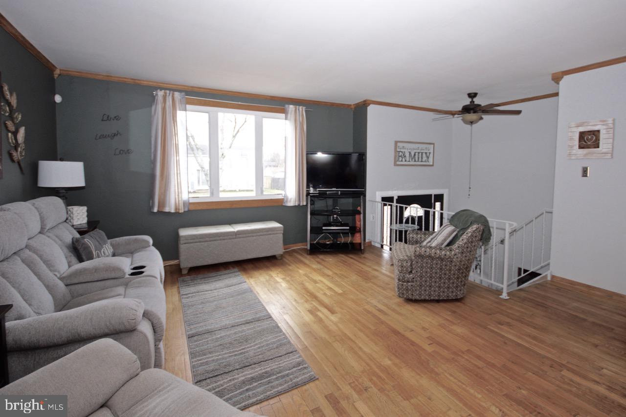 14 Constitution Road Clementon, NJ 08021 - Photo 3 of 27 a living room with furniture and a wooden floor