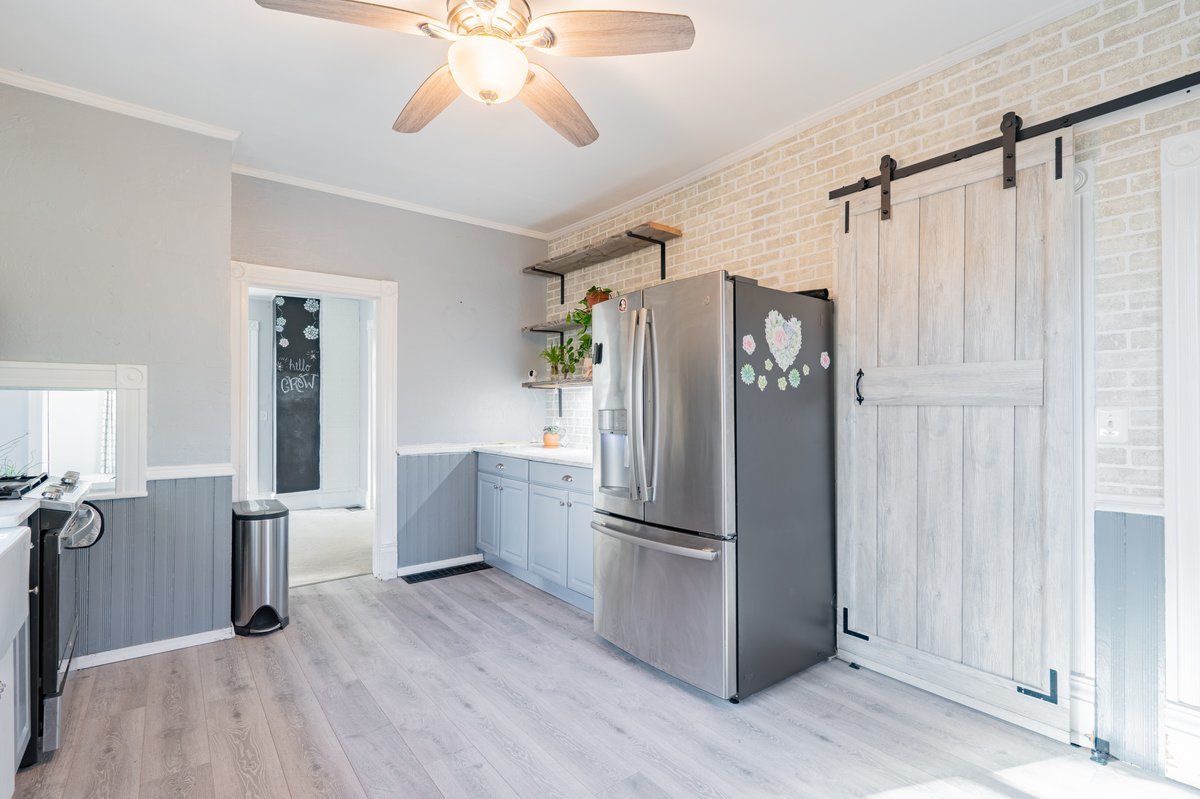 802 South Fell Avenue Normal, IL 61761 - Photo 12 of 25 a kitchen with stainless steel appliances a refrigerator and cabinets