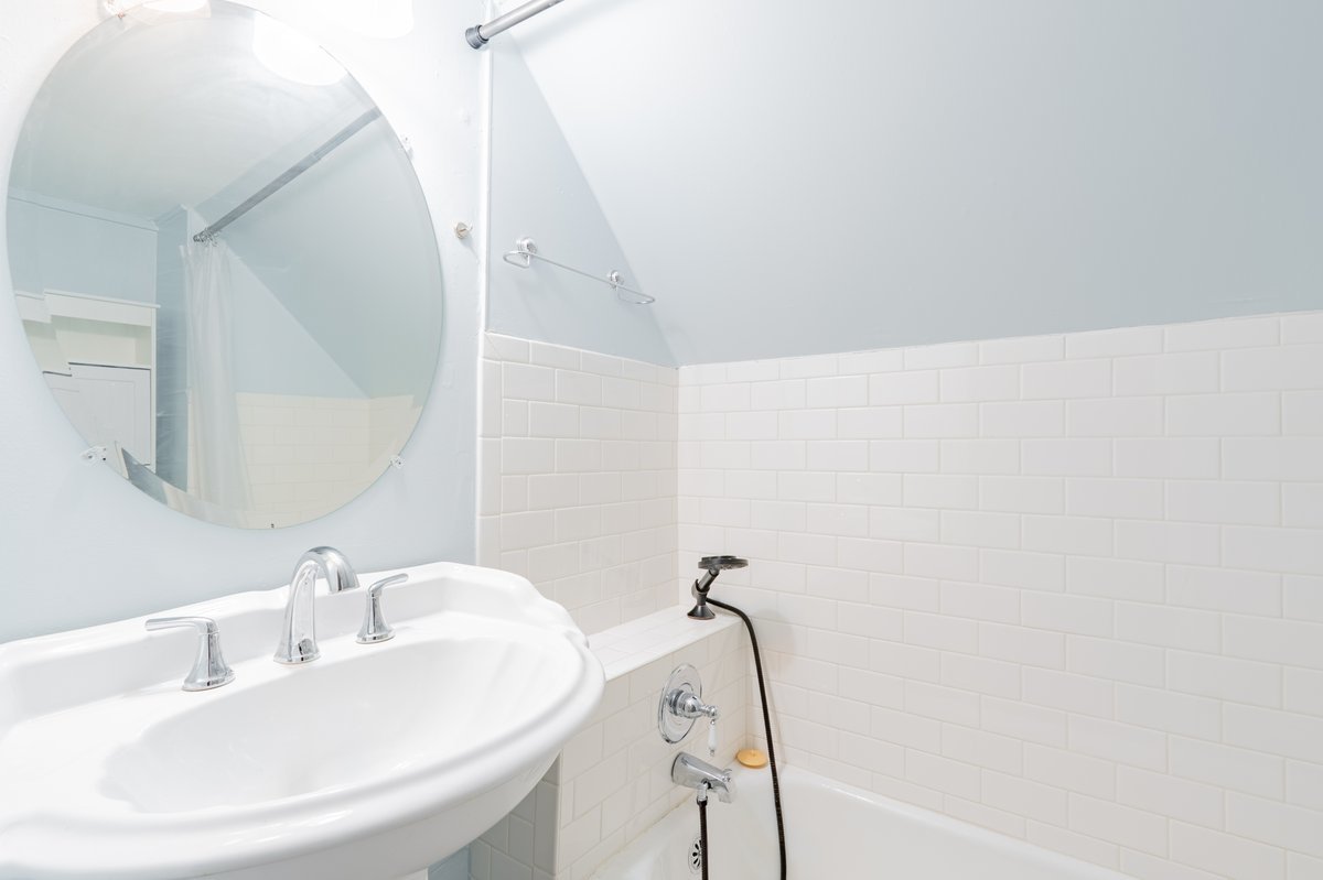 802 South Fell Avenue Normal, IL 61761 - Photo 21 of 25 a bathroom with a sink and mirror