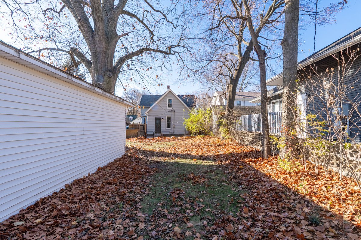 802 South Fell Avenue Normal, IL 61761 - Photo 23 of 25 a view of a yard with a tree