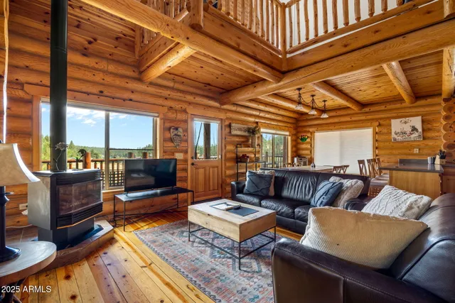 a view of a patio with a table and chairs