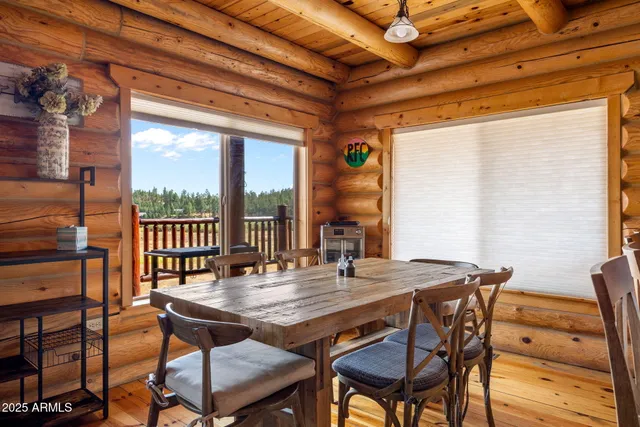 a kitchen with lots of counter top space and wooden floor