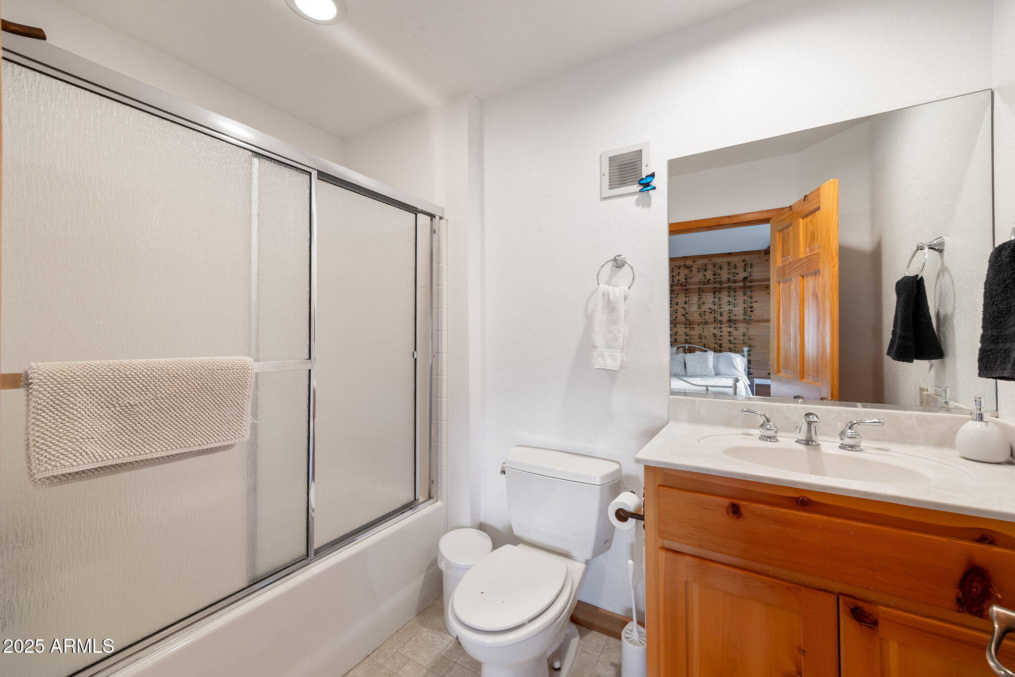 100 Main Street Greer, AZ 85925 - Photo 33 of 63 a bathroom with a sink a toilet and shower