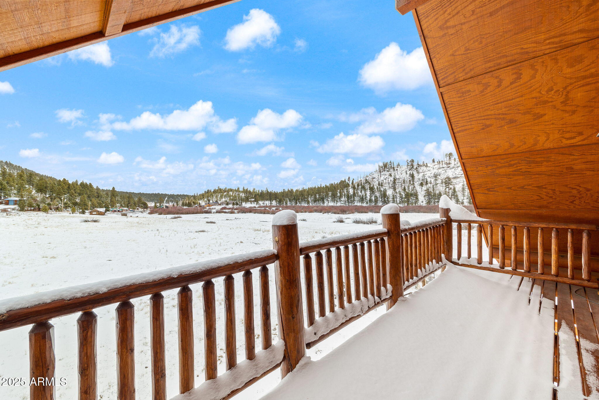 100 Main Street Greer, AZ 85925 - Photo 46 of 63 a balcony with city view