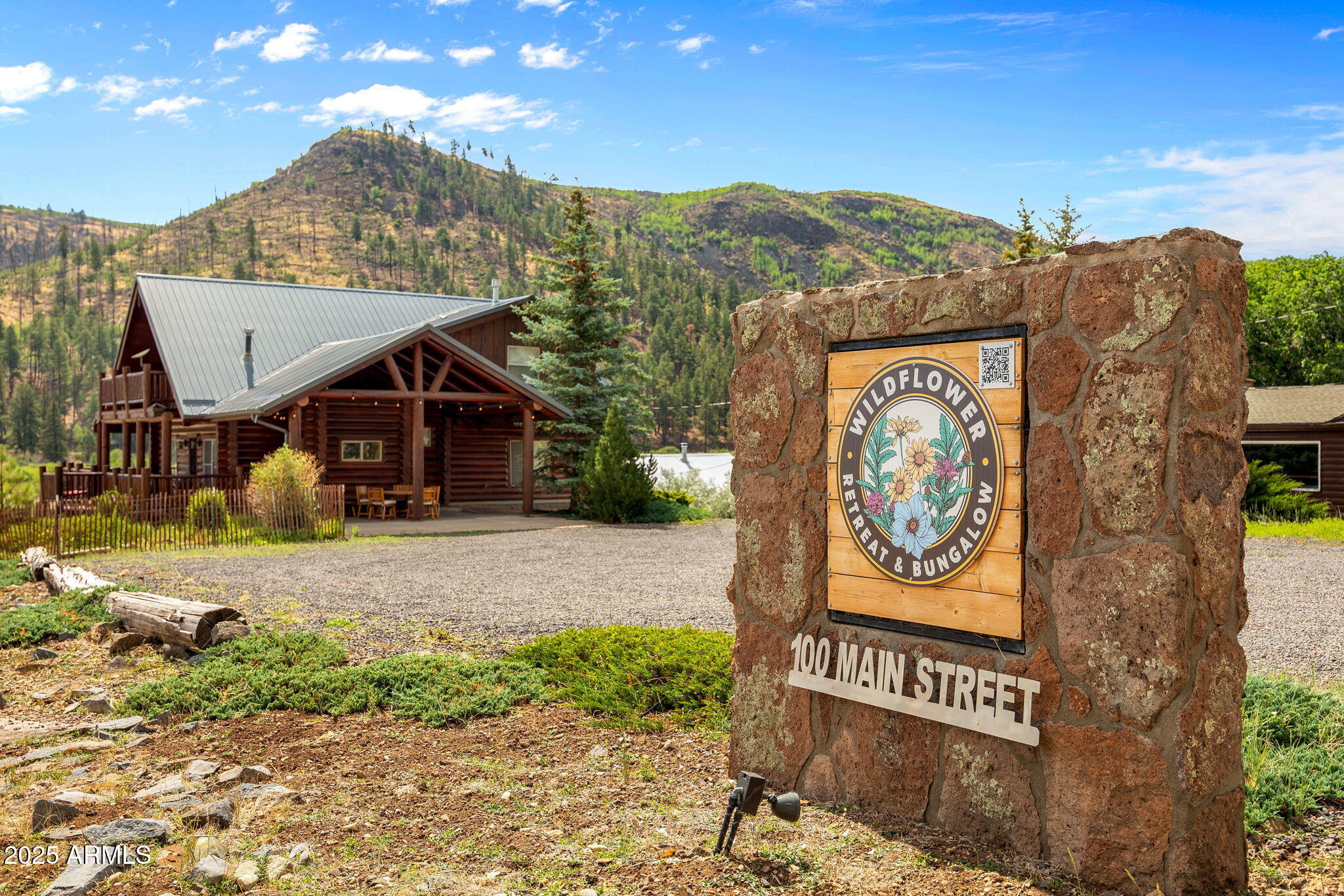 100 Main Street Greer, AZ 85925 - Photo 5 of 63 a view of a house with a park