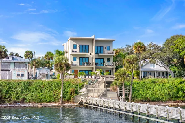 a view of a city with a lake