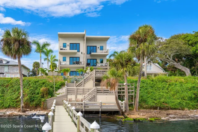 a view of a balcony with chairs