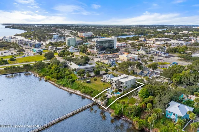 a black and white photo of a living room
