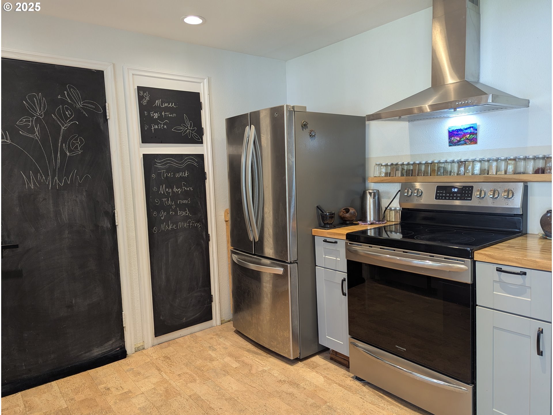 3155 Northeast Lancaster Street Corvallis, OR 97330 - Photo 12 of 27 a kitchen with stainless steel appliances granite countertop a refrigerator and a stove top oven