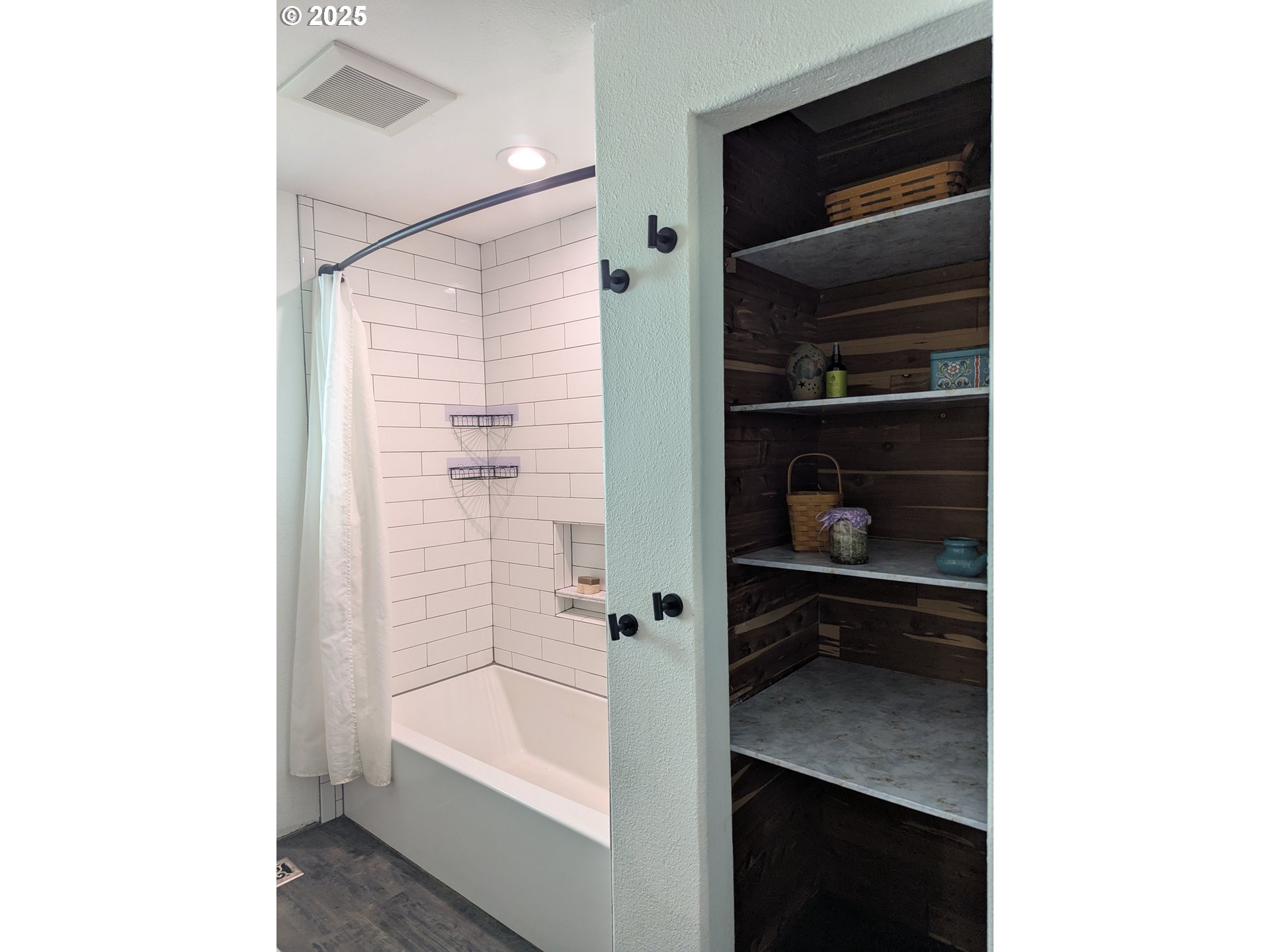 3155 Northeast Lancaster Street Corvallis, OR 97330 - Photo 16 of 27 a bathroom with a bathtub and a shower