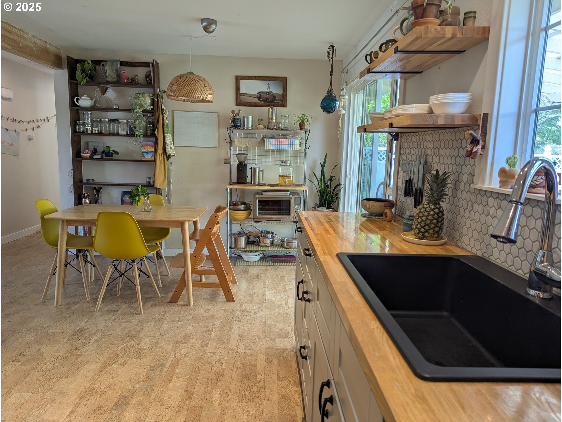 3155 Northeast Lancaster Street Corvallis, OR 97330 - Photo 10 of 27 a kitchen with stainless steel appliances granite countertop a sink and cabinets