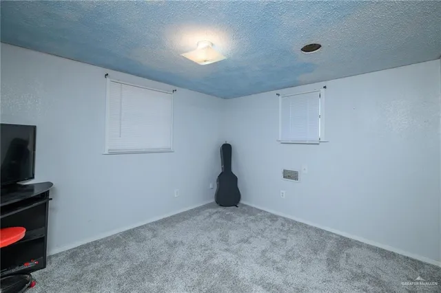 a room with closet and wooden floor
