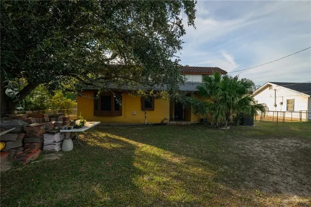 a house with trees in front of it