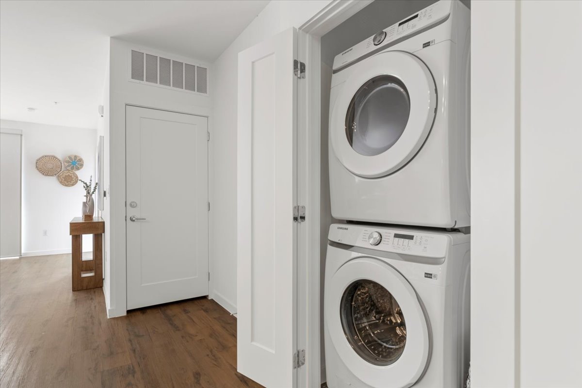 4801 Springdale Road, Unit 1107 Austin, TX 78723 - Photo 22 of 40 a view of a hallway with washer and dryer