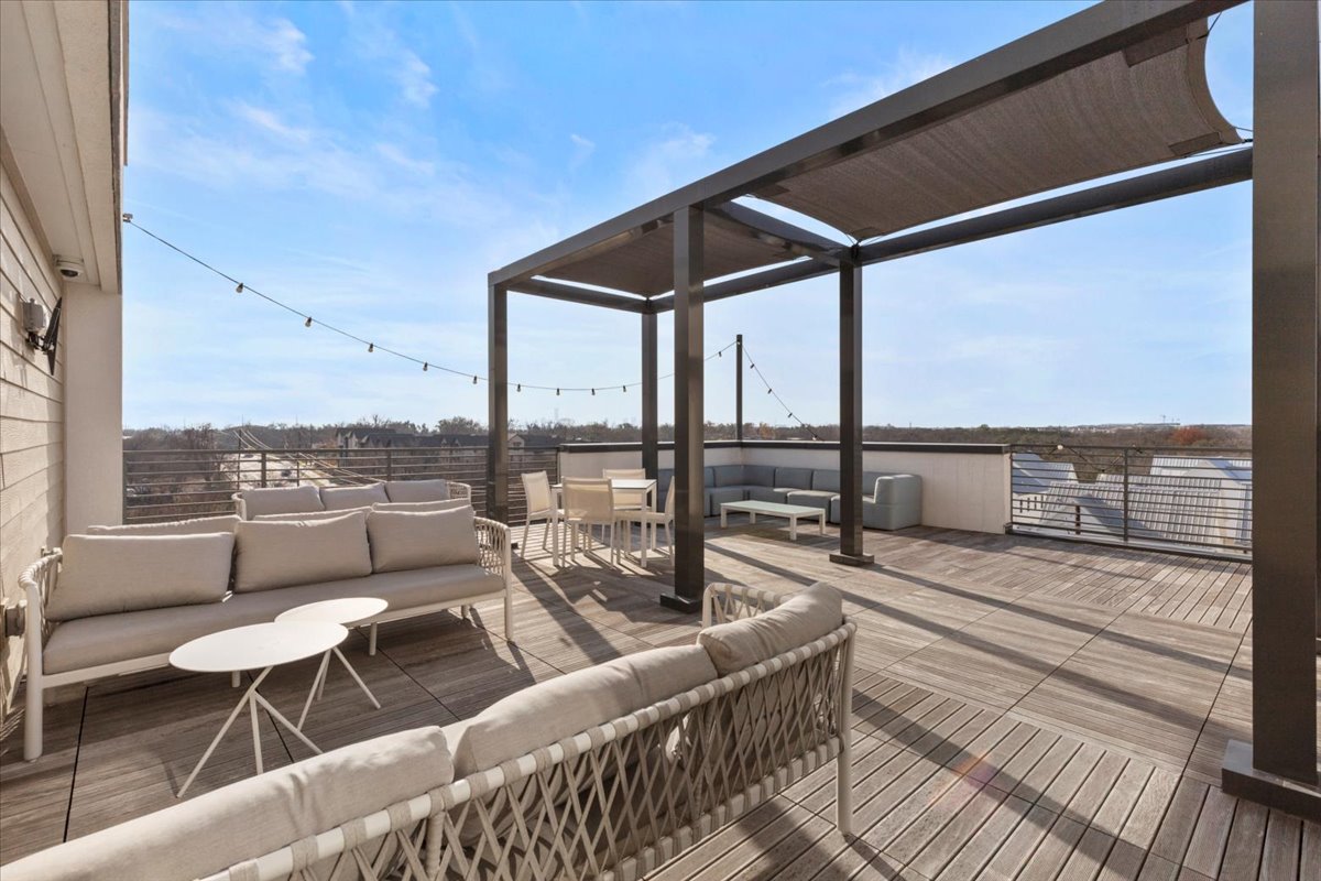 4801 Springdale Road, Unit 1107 Austin, TX 78723 - Photo 30 of 40 a roof deck with couch