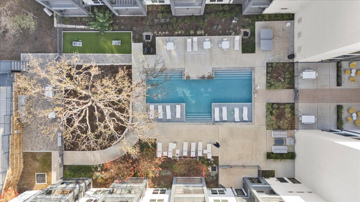 4801 Springdale Road, Unit 1107 Austin, TX 78723 - Photo 35 of 40 Aerial view of a pool area