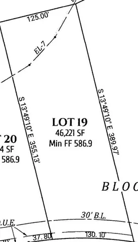 an aerial view of a house with outdoor space