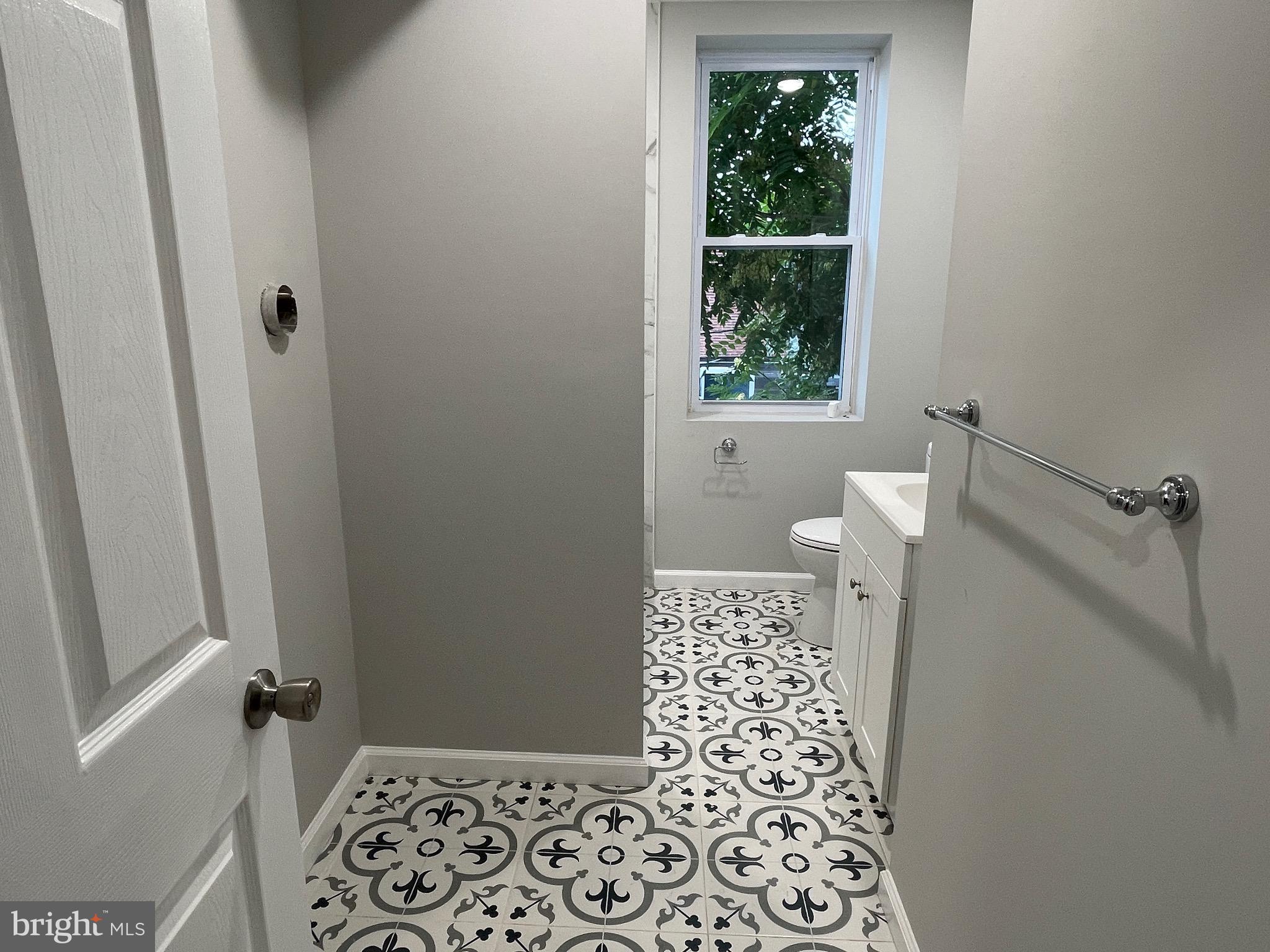 1960 Bridge Street Philadelphia, PA 19124 - Photo 12 of 30 hall bath with laundry hook ups