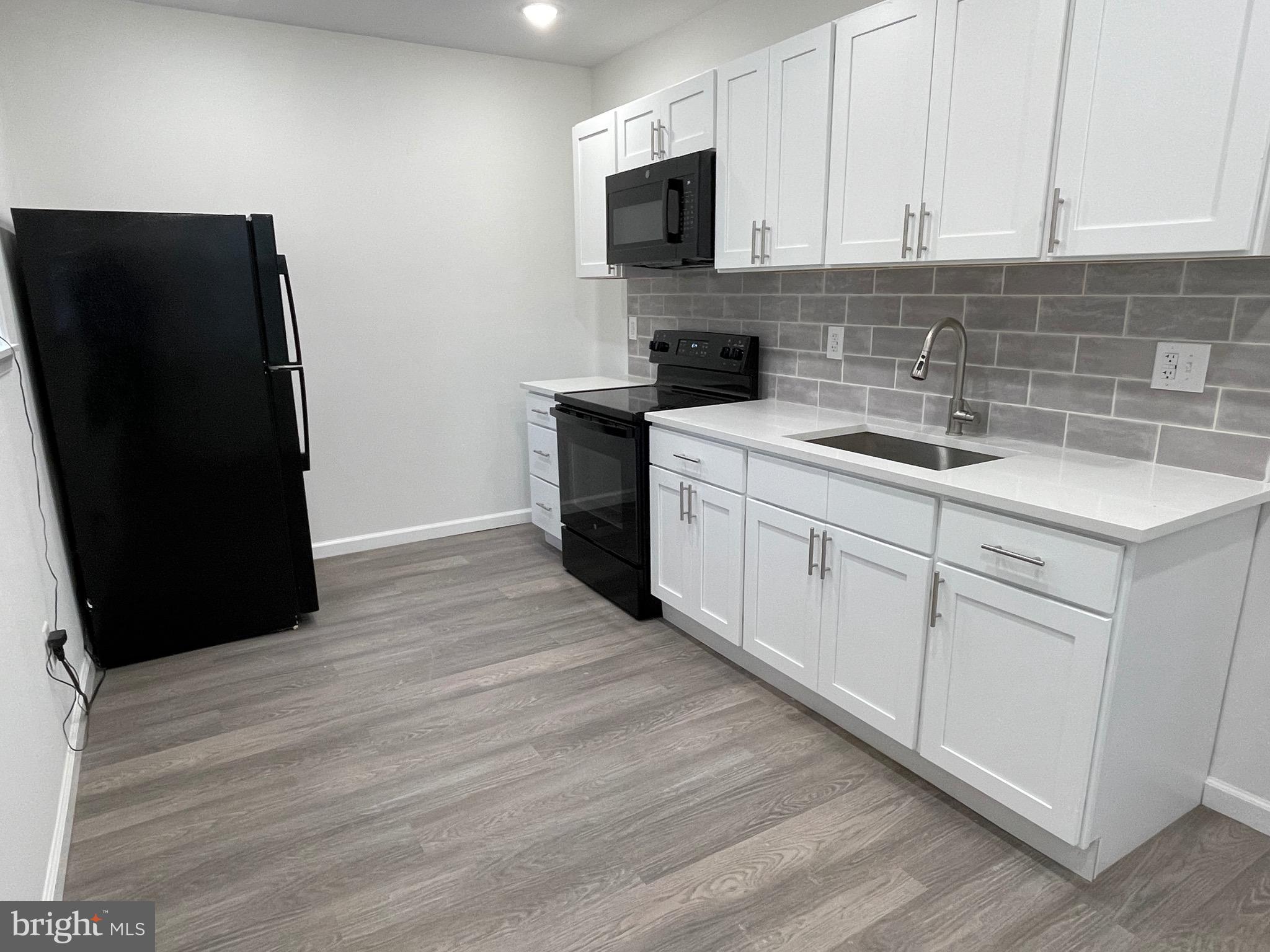 1960 Bridge Street Philadelphia, PA 19124 - Photo 19 of 30 first floor kitchen