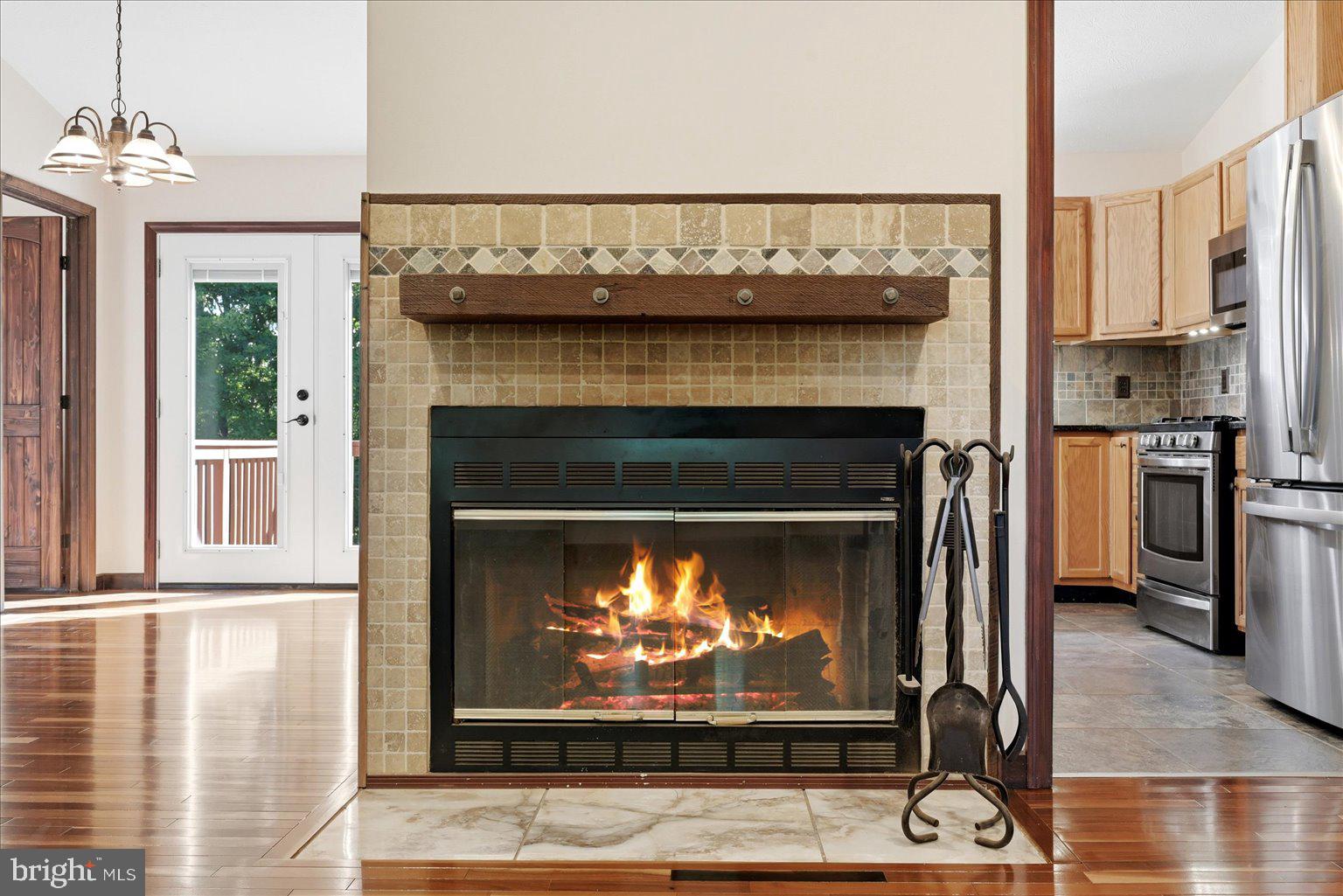323 South Timber Ridge Road Cross Junction, VA 22625 - Photo 20 of 109 Cozy fireplace warms inviting space.