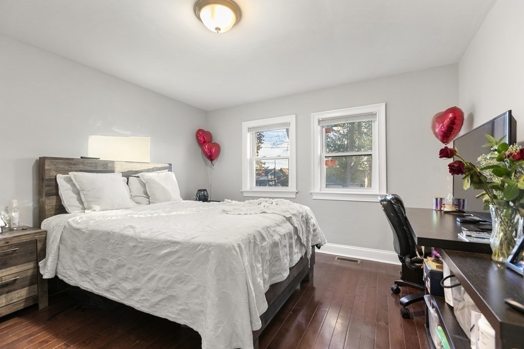 61 Patten Drive Marlborough, MA 01752 - Photo 11 of 20 a bedroom with a bed and a desk