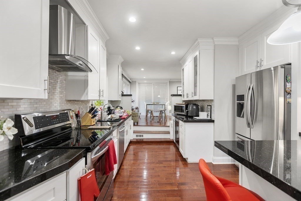 61 Patten Drive Marlborough, MA 01752 - Photo 5 of 20 a kitchen with stainless steel appliances a refrigerator sink and stove