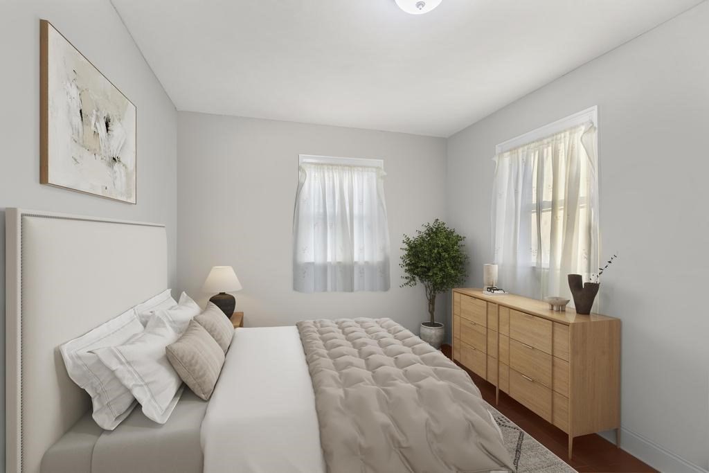 61 Patten Drive Marlborough, MA 01752 - Photo 10 of 20 a bedroom with a bed and a window