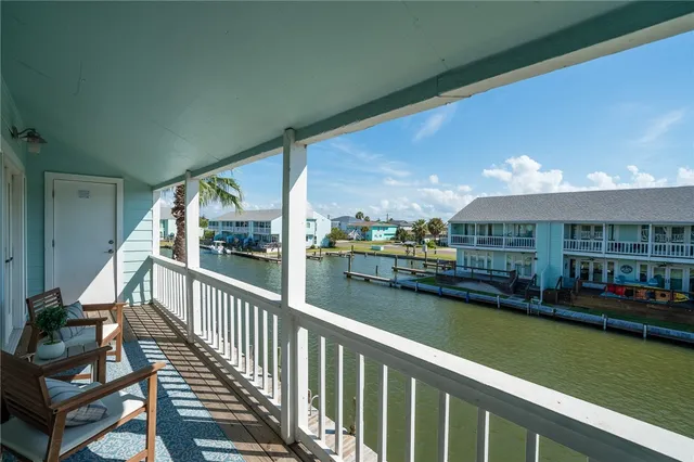 a view of swimming pool from a balcony