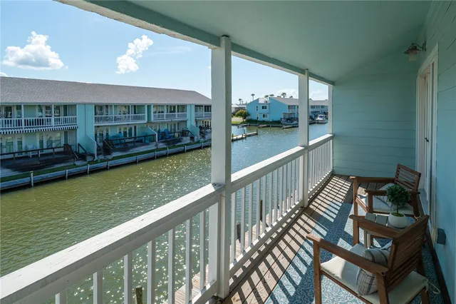 a view of a balcony with lake view