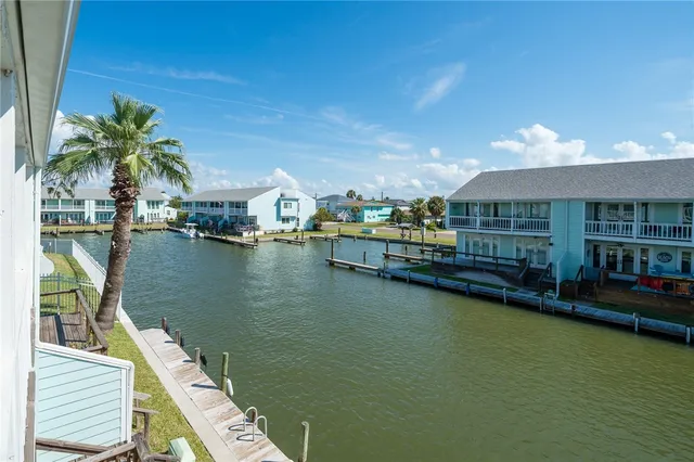 a view of a lake with a house