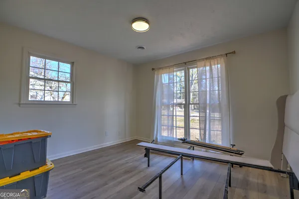 a view of workspace with furniture and a window