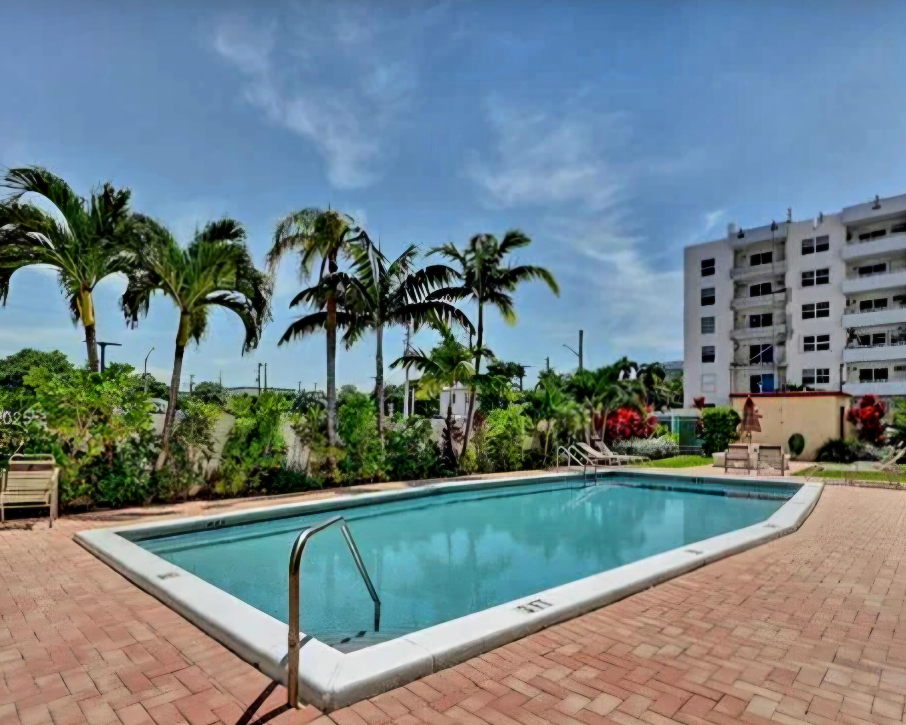 200 South Birch Road, Unit 208 Fort Lauderdale, FL 33316 - Photo 5 of 22 a view of swimming pool with a patio