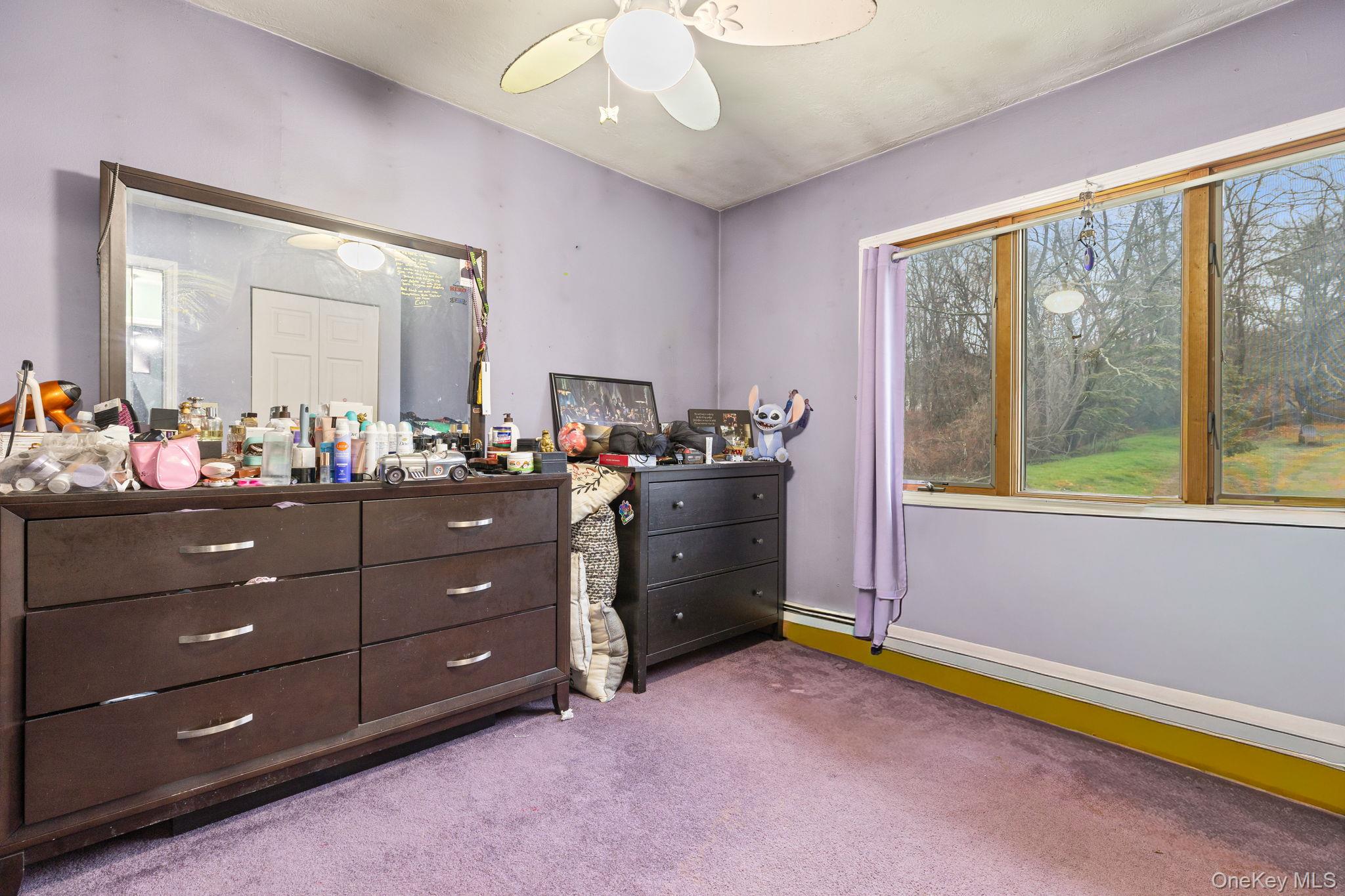 11 Cross Creek Road Cold Spring, NY 10516 - Photo 32 of 43 Bedroom featuring light carpet and a ceiling fan