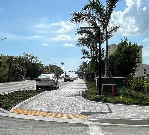 a view of swimming pool with a patio