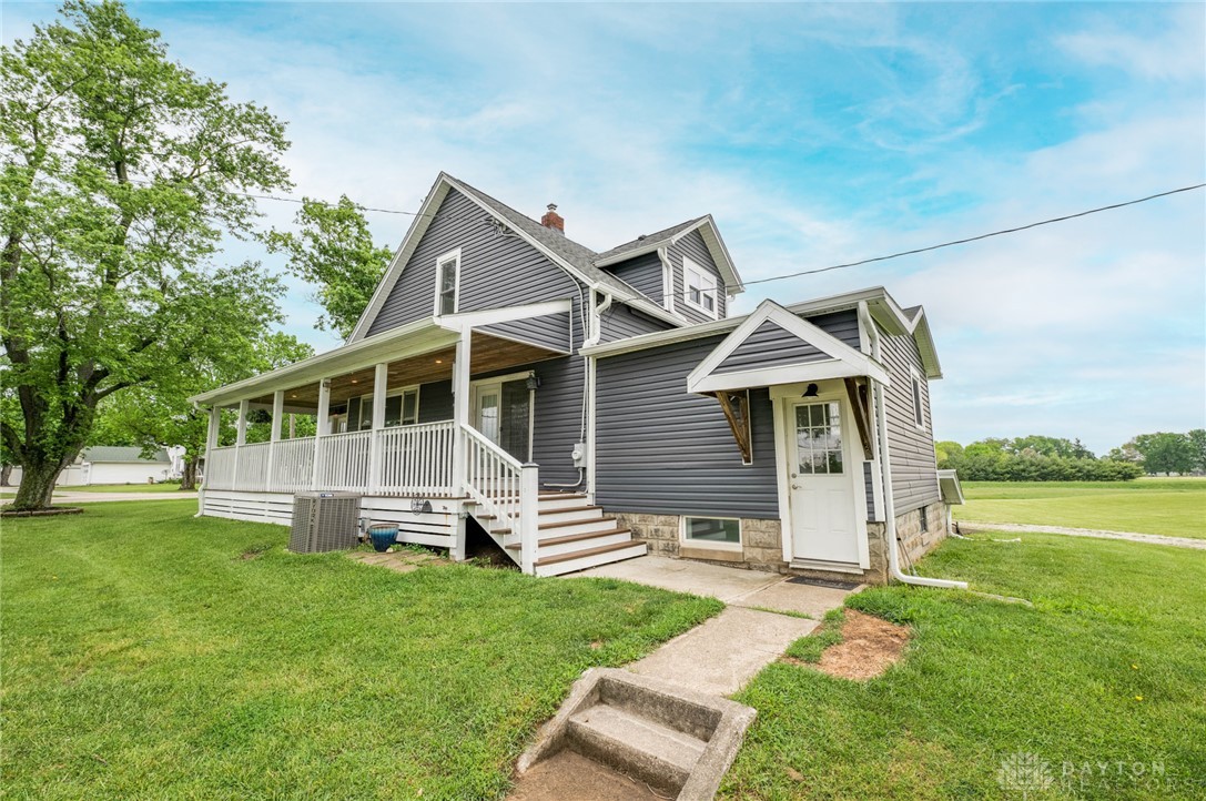 190 Swailes Road Troy, OH 45373 - Photo 61 of 82 This charming residence features a classic exterior with a welcoming porch and a spacious yard.