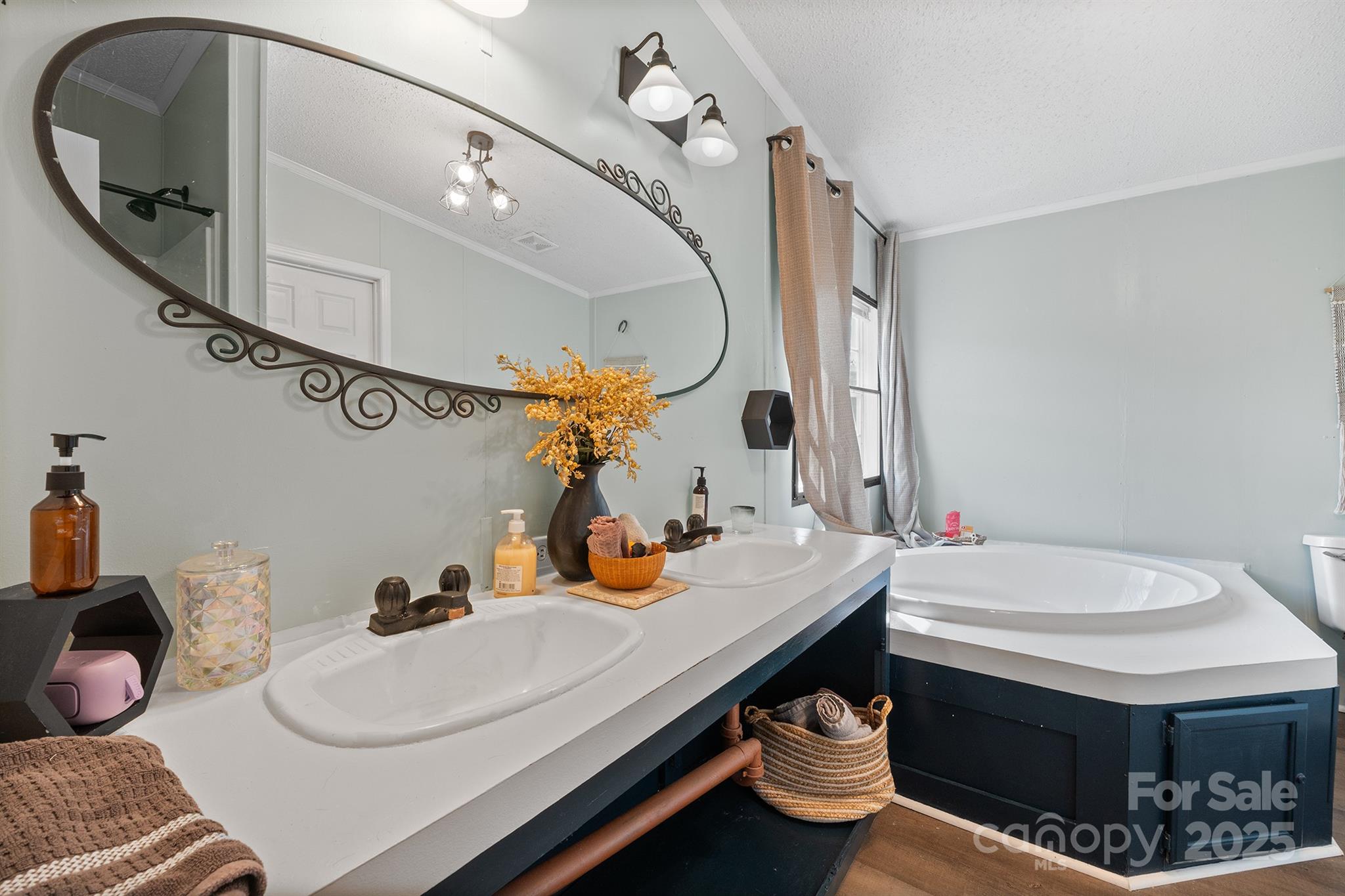 10483 Troutman Road Midland, NC 28107 - Photo 14 of 21 a bathroom with a sink mirror and toilet