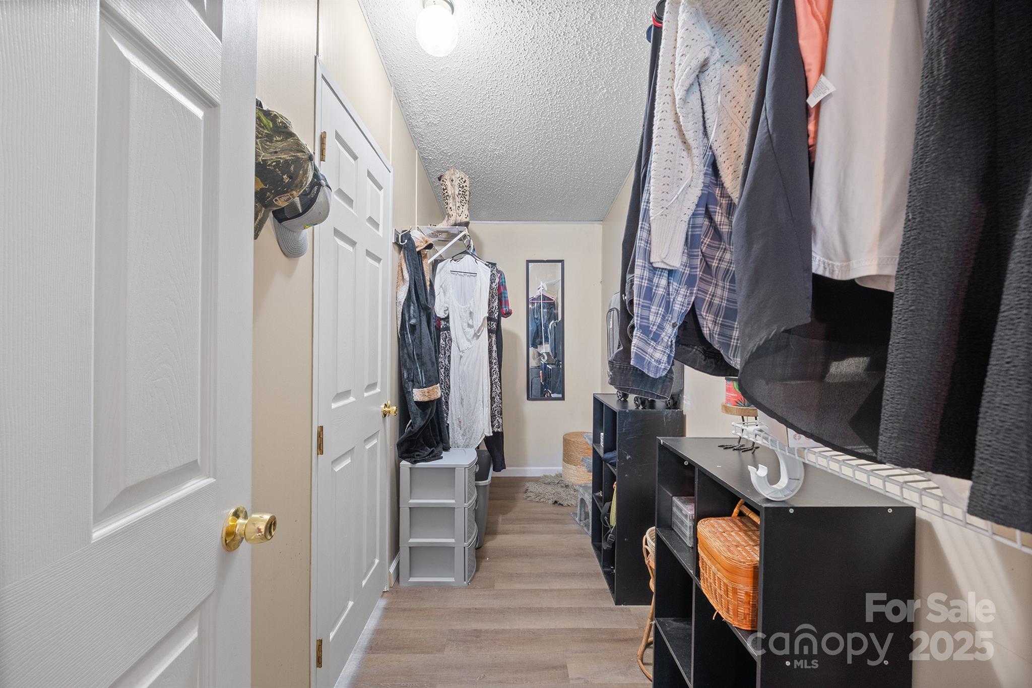 10483 Troutman Road Midland, NC 28107 - Photo 15 of 21 a view of walk in closet