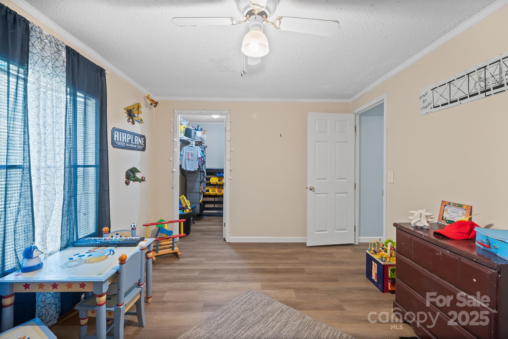 10483 Troutman Road Midland, NC 28107 - Photo 17 of 21 a view of a dining room with furniture and wooden floor