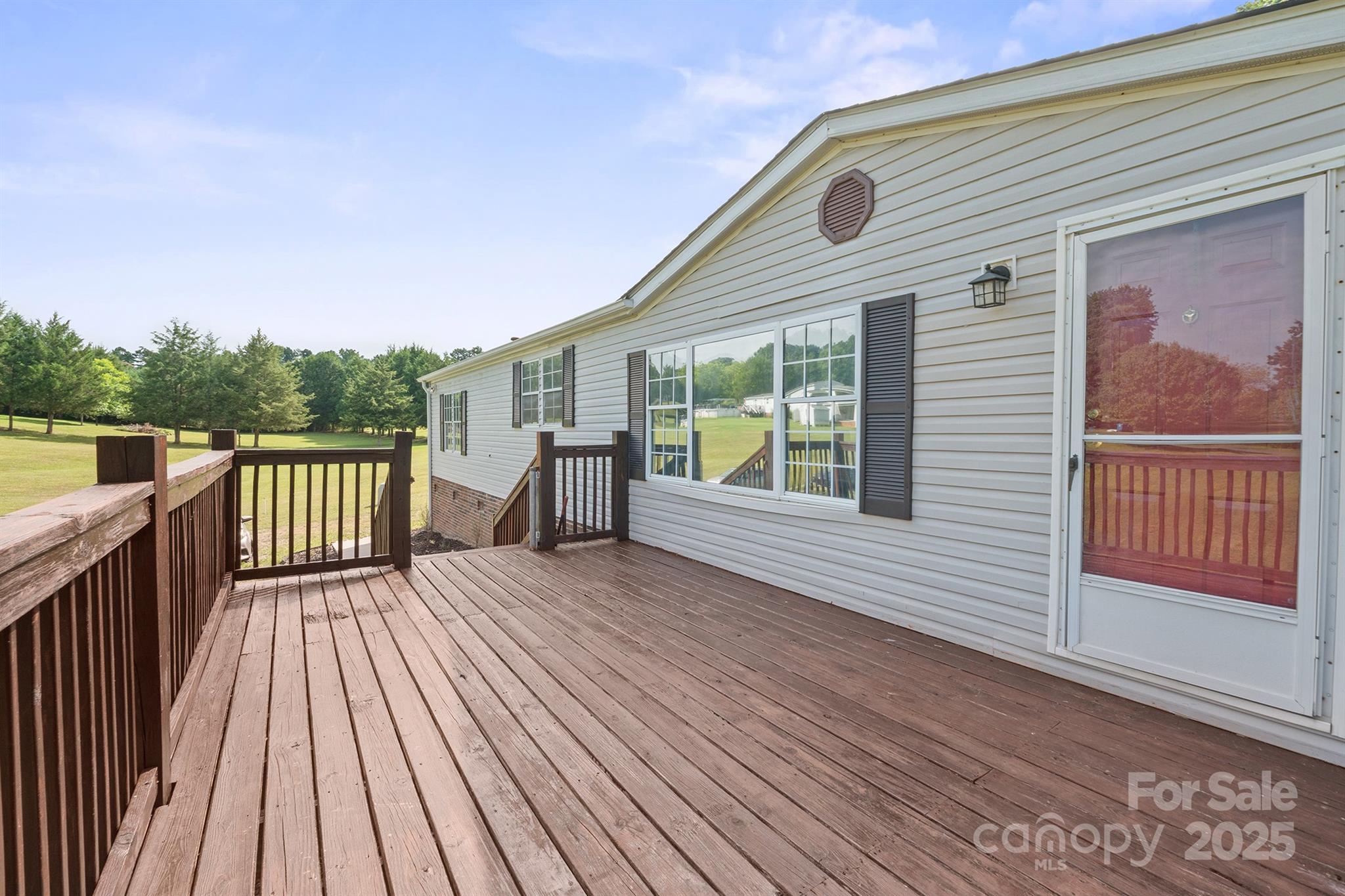 10483 Troutman Road Midland, NC 28107 - Photo 2 of 21 a balcony view with a outdoor space